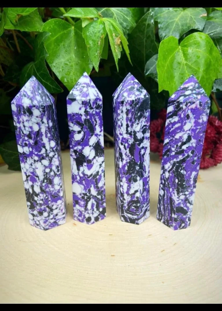 Purple, Black and White Towers