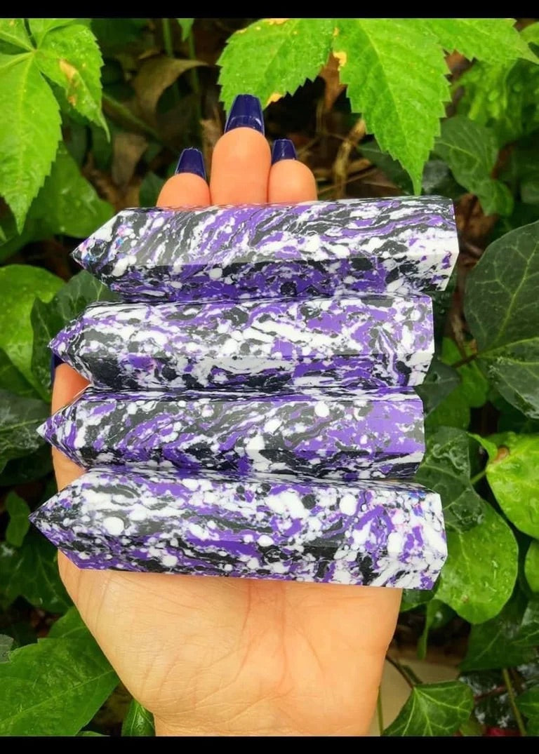 Purple, Black and White Towers