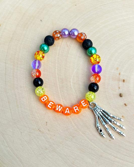 Beware Skeleton Hand Bracelet